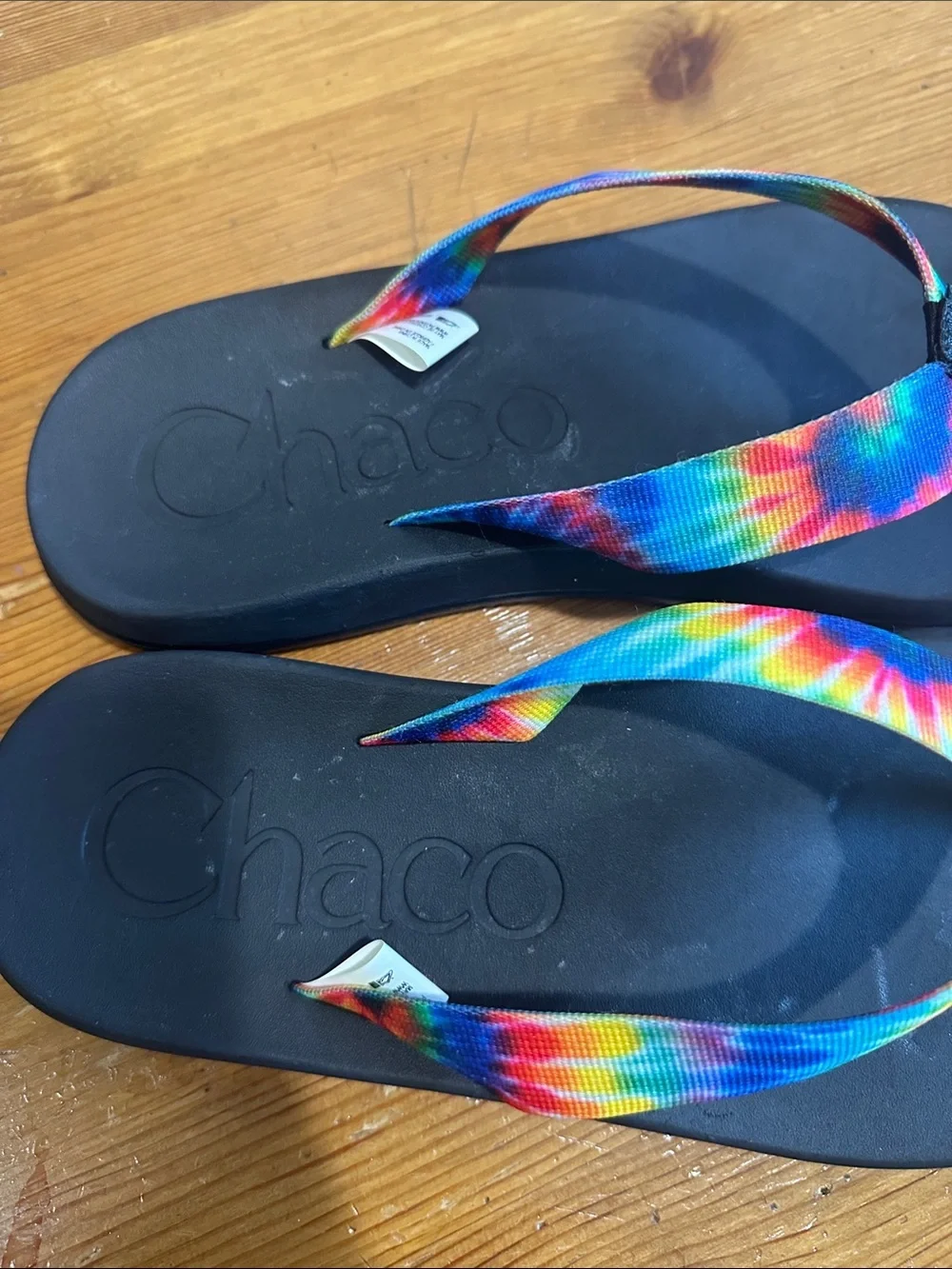 Chaco Black Flip Flops with Rainbow Tie-Dye Straps